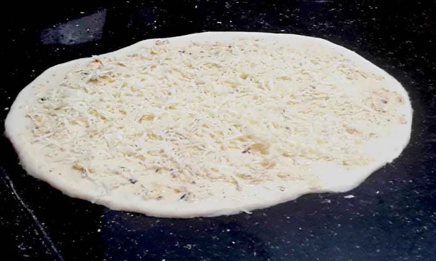 Cheese-Pizza-Rolls-Cheese-on-Dough-Sheet